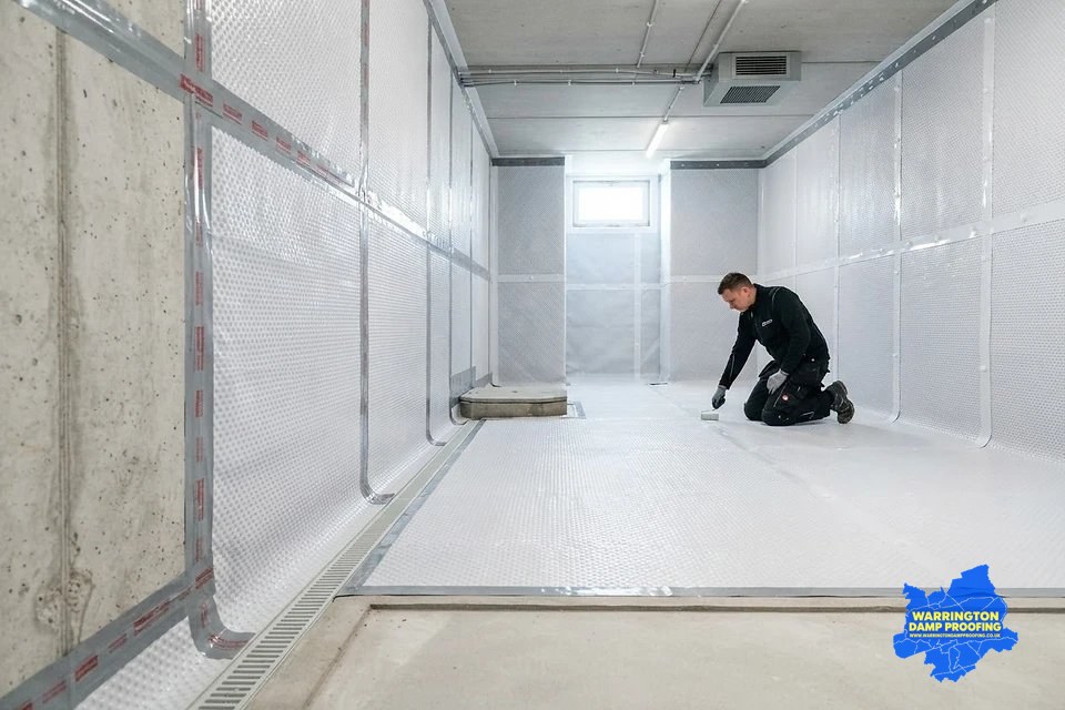 Cavity drain membrane waterproofing system fitted to a cellar wall and floor